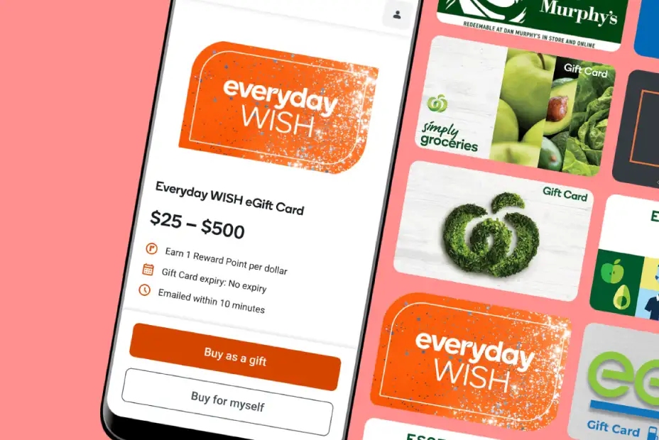 A smartphone screen displaying the Everyday Rewards app with an Everyday WISH eGift card selected, showing purchase options for $25 to $500 alongside other gift card tiles for Woolworths and Dan Murphy's.